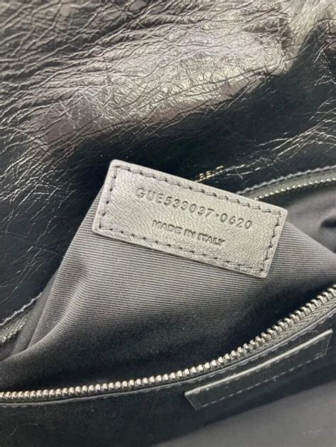 logo ysl falso|ysl bag serial number label.